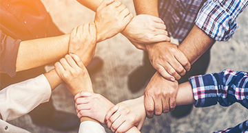 Interlocking hands representing APWA membership